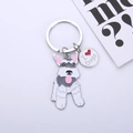 Vue macro détaillée du porte-clés Schnauzer en métal avec médaille gravée I Love Dogs - 45mm / Gris/Blanc