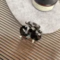 Mini acetate hair claw clip with black and white marble pattern for elegant styling - 3.5cm / Obsidian