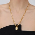 Double-layered gold snake chain necklace featuring a vintage heart pendant for women - Gold
