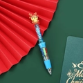 Christmas 4-color ballpoint pen with blue reindeer topper and star glitter sand - Series 3 - Reindeer