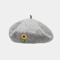 Detail shot of sunflower embroidery on grey wool beret with high-quality fabric texture - One Size / Gray