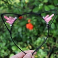Detail of handmade cat ear headband with pink crystals and black wire frame - No.76 Barbie Pink
