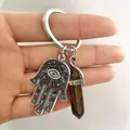 Tiger eye crystal hexagonal point keychain with Hand of Fatima and Evil Eye charm - Tiger's Eye