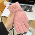 Detail of pink knitted glove featuring soft mohair texture and leather fashion label - Open Finger Candy Color Pink