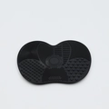 Detail of black silicone brush cleaning mat featuring diverse surface textures for washing - Small Apple Shape / Black