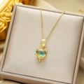 Elegant gold fox pendant necklace with blue-green gradient stone on jewelry box - Small Fox Temperature Sensitive Pendant (C528) / Gold