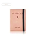 Pink PU leather travel passport holder featuring an elastic strap and embossed airplane icon - Strap Passport Cover / Pink
