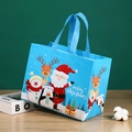 Blue Christmas gift bag with Santa and reindeer patterns made of non-woven fabric - Light Blue Santa