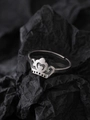 Detailed view of silver crown luminous ring on textured black paper background - Crown Style (NR301)