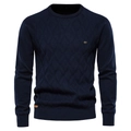 Macro view of navy blue crew neck sweater showing knit diamond pattern and brand tag - S / Dark Blue