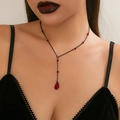 Gothic black Y-shaped necklace with red crystal beads and blood drop pendant on a model - 01 Black+Red Y-Shape Necklace