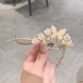 Elegant gold flower hair clip with pearl butterfly design and long tassels accessory - Butterfly Tassel Pearl Hair Clip
