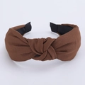 Minimalist brown knotted headband in textured fabric with a stylish solid color finish - Coffee