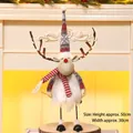 50cm glowing Christmas reindeer doll with grey knitted hat and warm LED lights on wood base - Swinging Glowing Grey (Female)