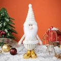 Gnome de Noël en peluche avec bonnet blanc et bottes dorées sur base de neige - Style Père Noël Doré 30CM