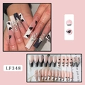 Detail of French press-on nails with glitter crown and lip prints in black and pink - LF348 Black White Pink Crown Lips