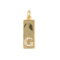 Detailed close-up of a golden rectangular pendant featuring a sparkling micro-set letter G - Letter G