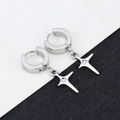 Detailed view of silver polished stainless steel hoop earrings with star pendants - Four-Pointed Star - Steel