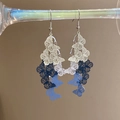 Detail of blue and white butterfly earrings with metal fringe and gradient layered design - White-Blue Gradient
