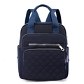 Navy blue nylon backpack with diamond quilted pattern and multiple zipper pockets - Dark Blue