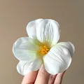 Elegant white mesh flower hair clip with yellow stamen and detailed fabric petals - Green Tulip
