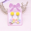 Cute kids clip-on earrings featuring colorful smiling flowers and yellow details - Colorful Flower