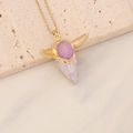 Detailed view of bohemian bull skull pendant with white and purple accents on gold chain - Purple and White Deco Gold Bull Skull (10#)