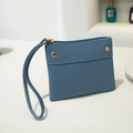 Minimalist light blue faux leather coin purse with wrist strap and gold stud detail - Sky Blue