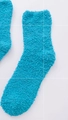 Soft blue coral fleece slipper socks in fluffy plush material for cozy home wear - Peacock Blue