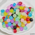 Colorful 6x8mm barrel-shaped resin spacer beads for DIY jewelry making in a shell dish - Multicolor