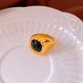 Macro detail of a vintage gold-plated square ring with a faceted black gemstone inlay - 8# Ring - Gold - Black