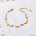 Double-layered gold titanium steel bracelet with hollow hearts and zircon star charms - White Rhinestone