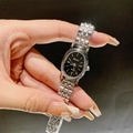 Women's quartz watch with silver steel strap, black oval dial and minimalist indices - Silver Band Black Dial