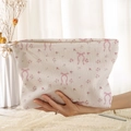 White corduroy cosmetic bag with pink floral and bow prints and zipper closure - White Pink Flower Bow (FP376743)