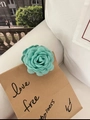 Franse vintage stoffen camelia haarklem in mintgroen met een handgemaakte uitstraling - Meergroen