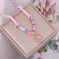 Close-up of Bohemian multicolored beaded necklace with a pink heart pendant on jewelry box - 5# Pink