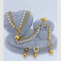 Elegant gold pearl jewelry set with necklace, bracelet, earrings and spherical pendants - Beaded Style
