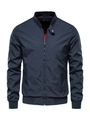 Detail of navy bomber jacket featuring orange lining and ribbed cuffs with metal snaps - M / 836 Navy