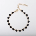 Detail of 18k gold plated stainless steel bracelet with black oil drip heart charms - Black