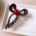 Leopard print claw clip with a vibrant red sphere accent in a vintage French style - Brown Claw Clip Decoration (158#)