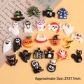 Flat lay of colorful Halloween resin charms including ghosts and pumpkins for DIY crafts - Halloween Series Random Mix