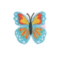 Close-up of butterfly hair clip with colorful sequins and pink ribbon duckbill clamp - Blue