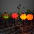 Solar powered orange pumpkin pathway lights for Halloween outdoor garden stake decor - Plastic Pumpkin Set of 4 (Color Light)