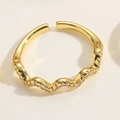 Detail of 14K gold plated wavy open ring featuring sparkling zircon stones for women - Wave / White Zirconia