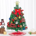 Close-up of a 60cm mini desktop Christmas tree with red berries, pine cones and ornaments - SYT310