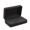 Portable black velvet ring box featuring three rows of storage slots for jewelry - Black