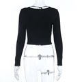 Detail of the backless design on this black slim fit long sleeve knitted crop top - S / Black