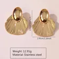 Golden stainless steel shell earrings with vertical texture and half-sphere stud top - Shell Radial Drop (FYD6076)