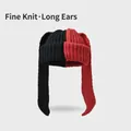 Detailed view of the tight-knit texture on the red and black long-ear beanie hat - One Size / Black Red Patchwork