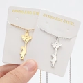Minimalist stainless steel necklace featuring a girl holding balloons pendant in gold and silver - Girl Balloon